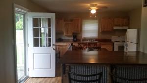 Kuchyň nebo kuchyňský kout v ubytování walker's retreat