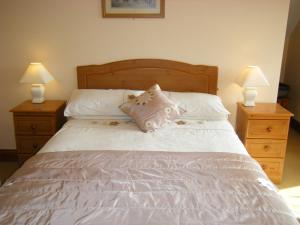 Tempat tidur dalam kamar di Ashfield B&B