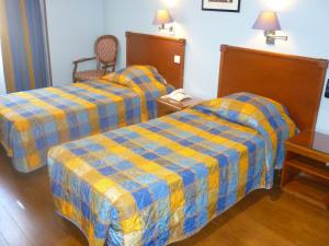 Postel nebo postele na pokoji v ubytování Baccarat Hostel