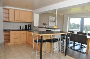 Kuchyň nebo kuchyňský kout v ubytování Vakantiewoning Leberg