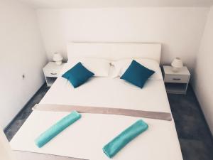 Postel nebo postele na pokoji v ubytování Apartments Marko