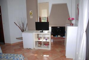 Et tv og/eller underholdning på Villa Butterfly