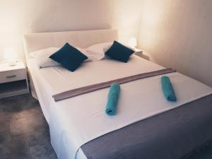 Postel nebo postele na pokoji v ubytování Apartments Marko