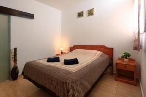 מיטה או מיטות בחדר ב-Holiday Apartment C Lanzarote