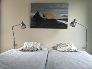 Voodi või voodid majutusasutuse La Chambre d'Amis toas