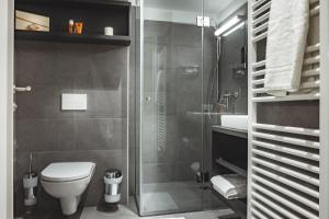 Ванна кімната в Oliver Apartments | contactless check-in
