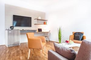 Кухня або міні-кухня у Oliver Apartments | contactless check-in
