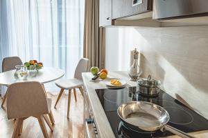 Кухня або міні-кухня у Oliver Apartments | contactless check-in