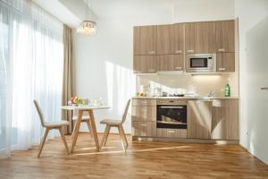 Кухня або міні-кухня у Oliver Apartments | contactless check-in