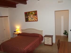 Postel nebo postele na pokoji v ubytování Hotel Genius + 37 fotografií