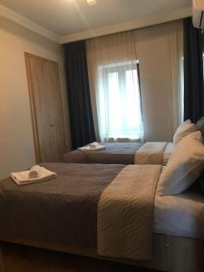 Letto o letti in una camera di Room 4 U