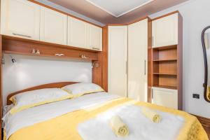 Postel nebo postele na pokoji v ubytování Apartment Noa Opatija