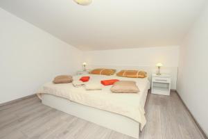 Ein Bett oder Betten in einem Zimmer der Unterkunft Guest House Katarina