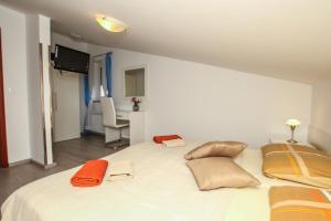 Ein Bett oder Betten in einem Zimmer der Unterkunft Guest House Katarina
