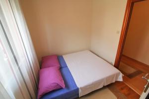Posteľ alebo postele v izbe v ubytovaní Apartman San Marino 2