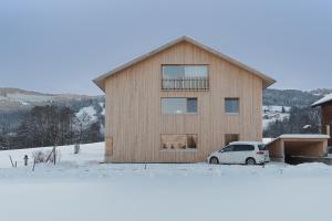 Ferienwohnung Wertvollholzhaus om vinteren