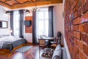 Posteľ alebo postele v izbe v ubytovaní Lovenovsky Apartments