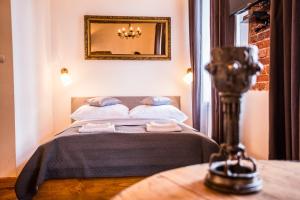 Posteľ alebo postele v izbe v ubytovaní Lovenovsky Apartments