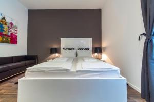 Postel nebo postele na pokoji v ubytování Priuli Luxury Rooms