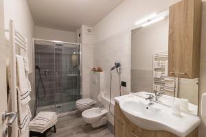 Koupelna v ubytování Hotel La Val + 37 fotografií