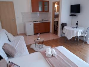 Photo de la galerie de l'établissement Apartmani Marino, à Privlaka