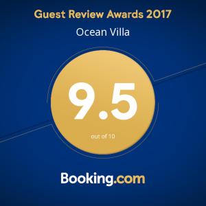 a yellow circle with the text quest review awards ocean ville at Ocean Villa with Private Pool in Ericeira