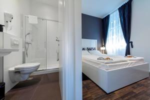 Kúpeľňa v ubytovaní Priuli Luxury Rooms + 37 fotografií