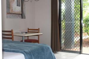 Ein Sitzbereich in der Unterkunft Bohemia Resort Cairns