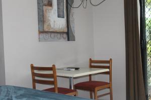 Ein Sitzbereich in der Unterkunft Bohemia Resort Cairns