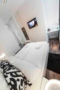 Postel nebo postele na pokoji v ubytování Priuli Luxury Rooms