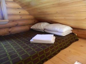 Кровать или кровати в номере Kauksi Puhkemaja