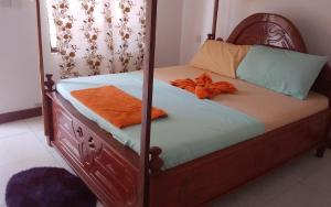 Säng eller sängar i ett rum på Kivulini Lodge and Restaurant
