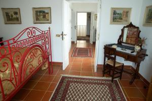 Postel nebo postele na pokoji v ubytování Palazzo Pulieri