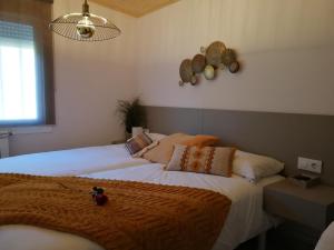 A bed or beds in a room at casa Francelos