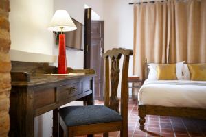 Rúm í herbergi á Thamel Villa Heritage Hotel