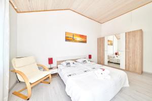 Posteľ alebo postele v izbe v ubytovaní Apartments Gvarda + 37 fotografií
