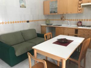 Kuchyň nebo kuchyňský kout v ubytování Casa Tiziana
