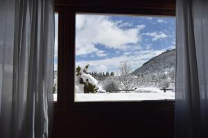 Nespecifikovaný výhled na hory nebo výhled na hory při pohledu z hotelu