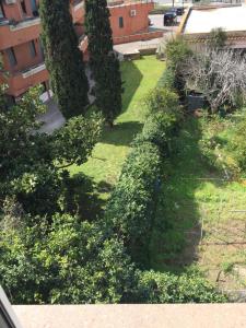 an overhead view of a garden with trees and bushes at EH Suites Rome Airport Euro House Hotels in Fiumicino