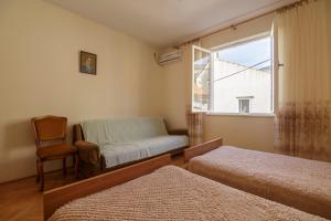 Postel nebo postele na pokoji v ubytování Apartman Željka