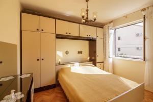 Postel nebo postele na pokoji v ubytování Apartman Željka