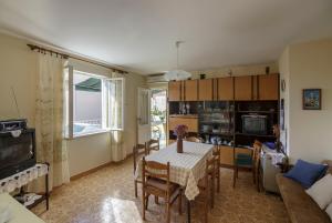 Kuchyň nebo kuchyňský kout v ubytování Apartman Željka
