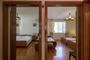 Postel nebo postele na pokoji v ubytování Apartman Željka