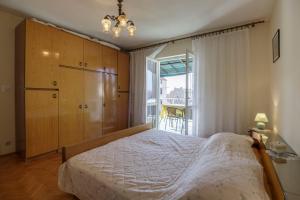 Postel nebo postele na pokoji v ubytování Apartman Željka