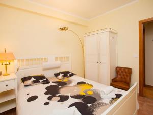 Posteľ alebo postele v izbe v ubytovaní Apartment Sardenya - Casp by Interhome