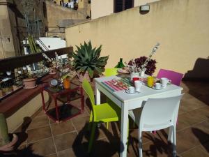 Reštaurácia alebo iné gastronomické zariadenie v ubytovaní La terrazza di Girgenti