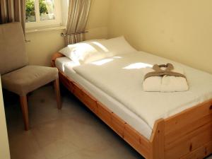 Postel nebo postele na pokoji v ubytování Bugenhagen - Classic Appartements