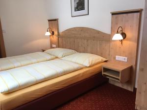 Postel nebo postele na pokoji v ubytování Landhaus Rieding
