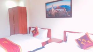 Postel nebo postele na pokoji v ubytování May Hong Hotel