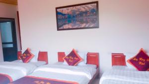 Postel nebo postele na pokoji v ubytování May Hong Hotel